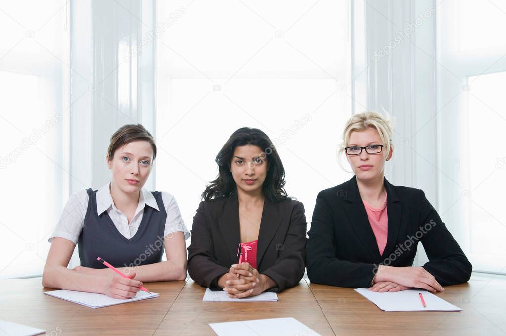 A portrait of three businesswomen