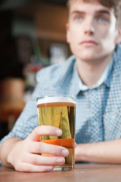 Young man in bar