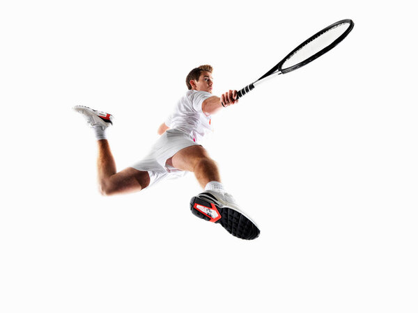 Man playing tennis isolated on white background 