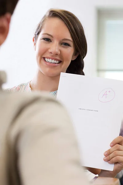 Successful Female High School Student Holding Assignment — Stock Photo, Image