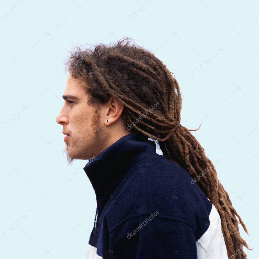 Young man with dreadlocks