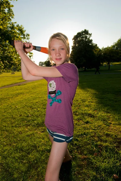 girl with softball bat