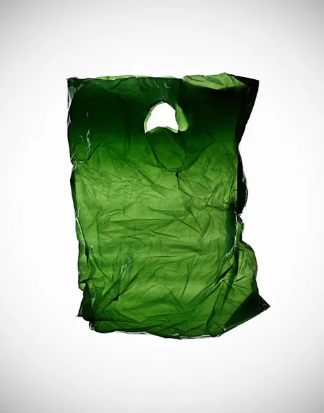 Bolsa Plástico Verde Arrugado Mesa — Foto de Stock