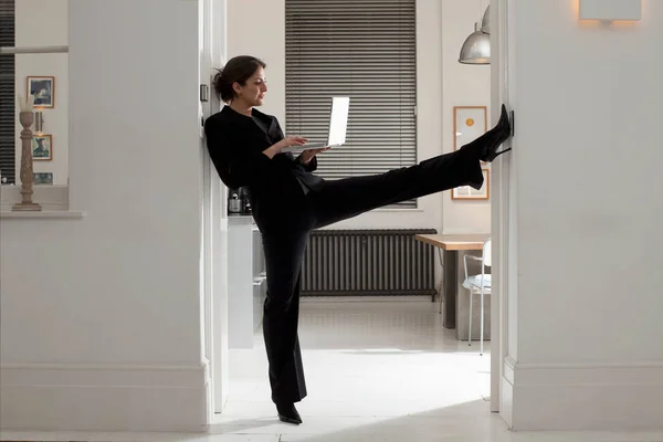 Woman Stretching Laptop — Stock Photo, Image