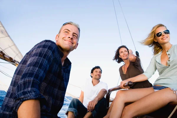 Two Couples Steering Sailing Boat — Stock Photo, Image