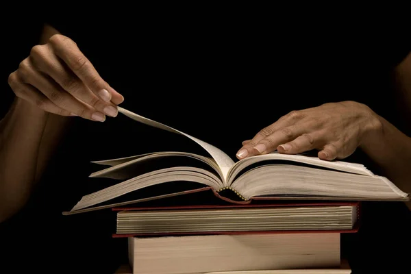 Hands Turning Book Page — Stockfoto