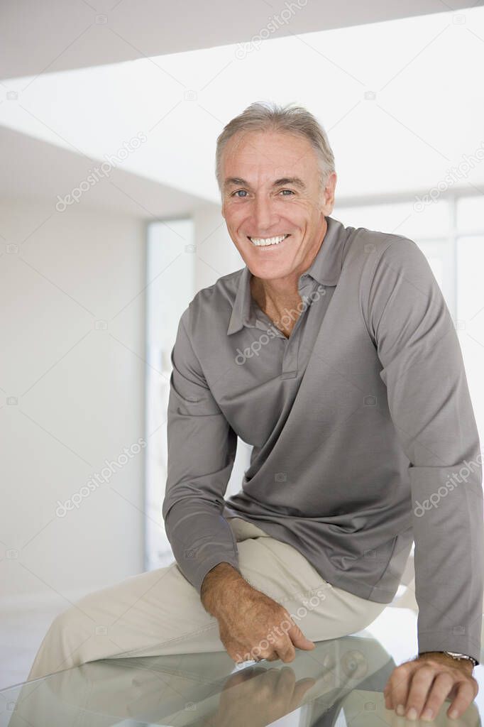 Mature man relaxing at home