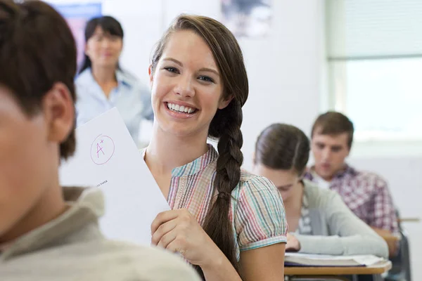 Successful Female High School Student Holding Assignment — Stock Photo, Image