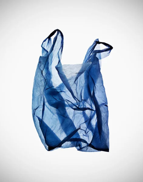 Zerknüllte Blaue Plastiktüte Auf Tisch — Stockfoto
