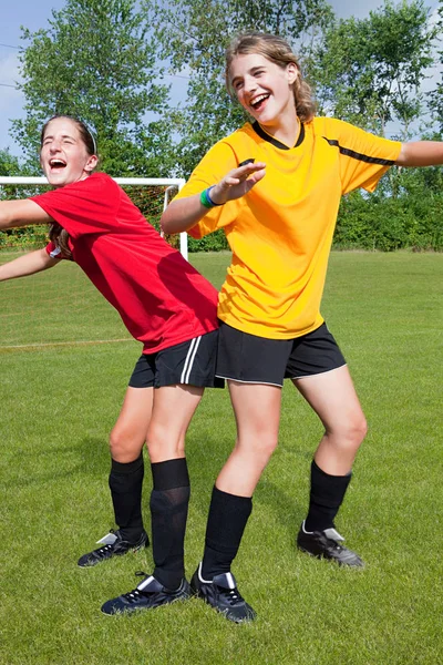 Girl soccer players messing around