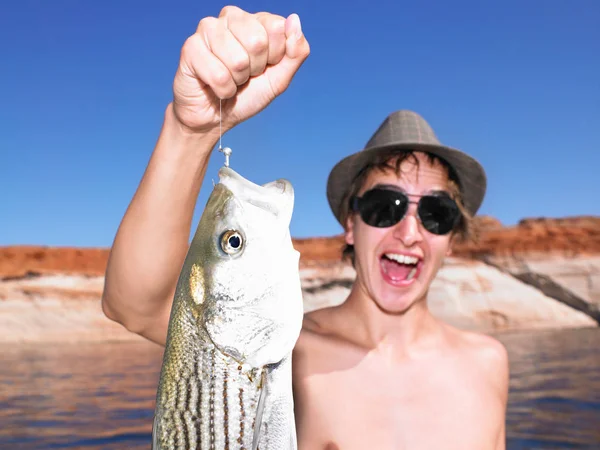 Man with fish smiling