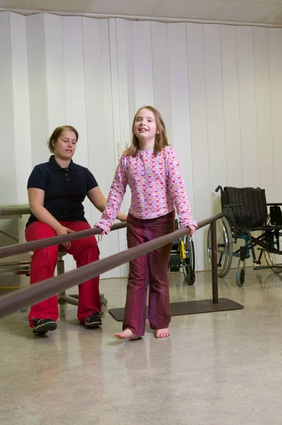 Girl Walking Using Support Bars — Stock Photo, Image