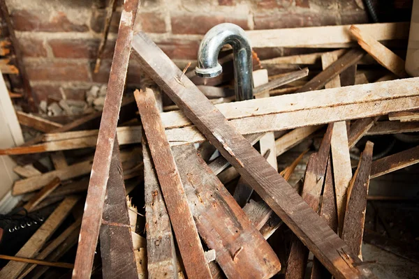 Pile of rubble and brick wall — Stock Photo, Image