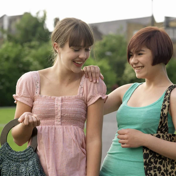 Young Woman Laughing Bags - Stock-foto