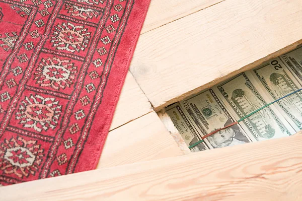 Hidden money under floorboards