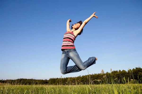 Woman Jumping Meadow Royalty Free Stock Photos