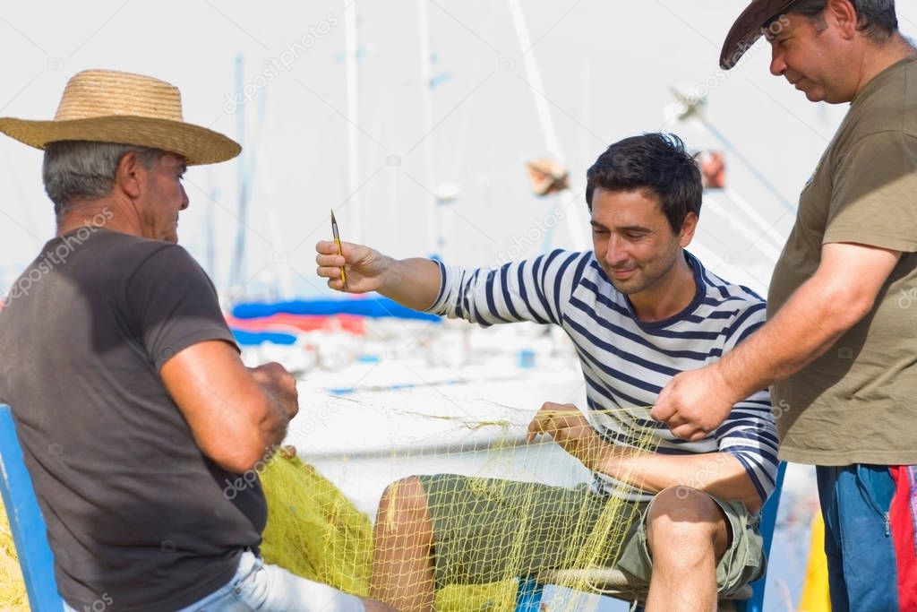 Fisher preparing their net