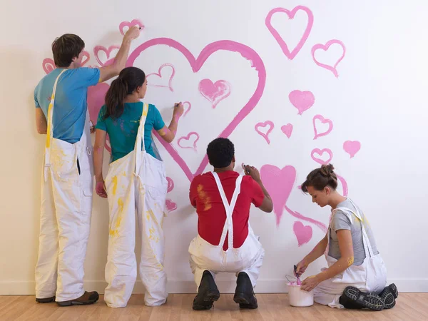 Grupo pintura corazones — Foto de Stock