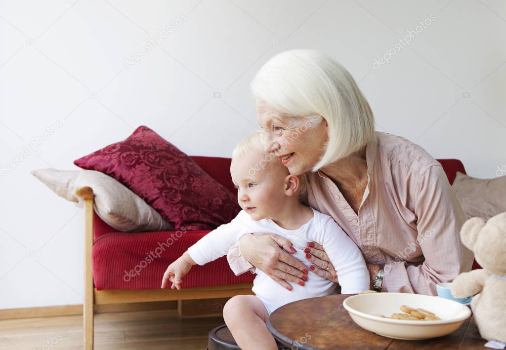 A grandmother talking to her grandson
