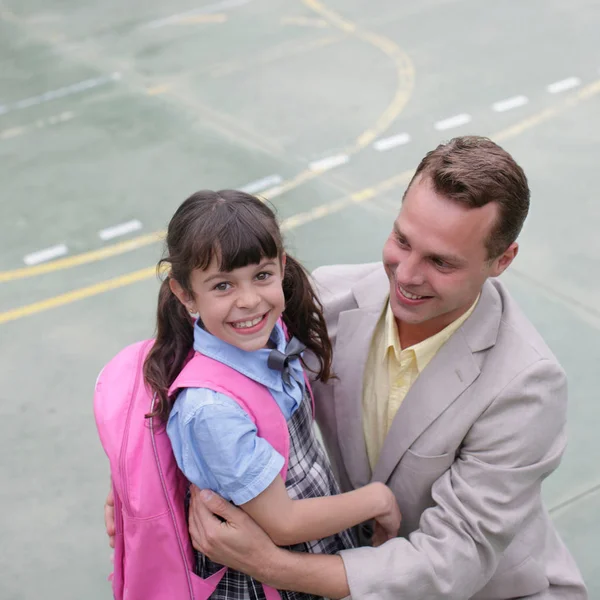 School Girl Hugging Father — Stock Photo, Image