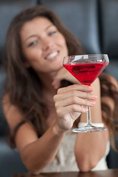 Young Lady Toasts Cocktail Stock Image