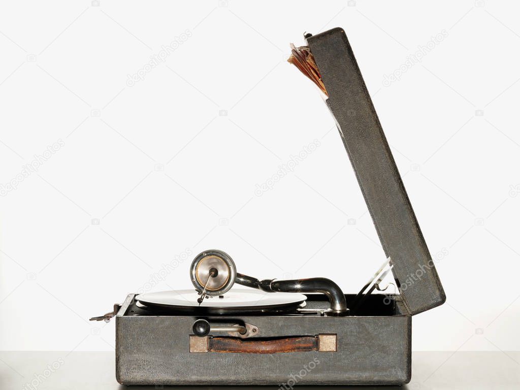 Vintage record player isolated on white background 