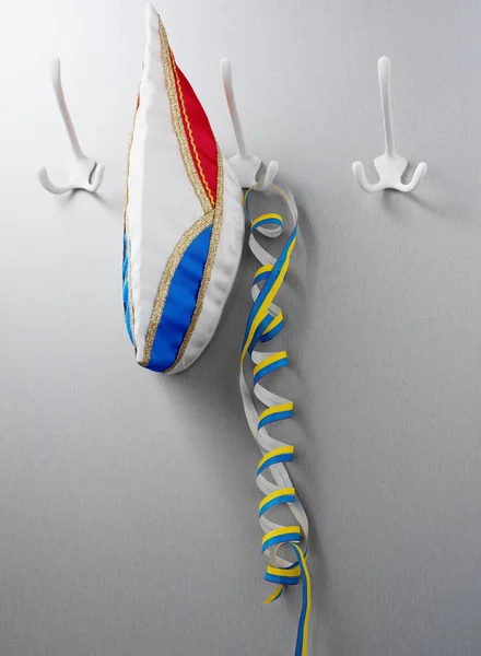 Carnival hat and streamer on hooks — 스톡 사진