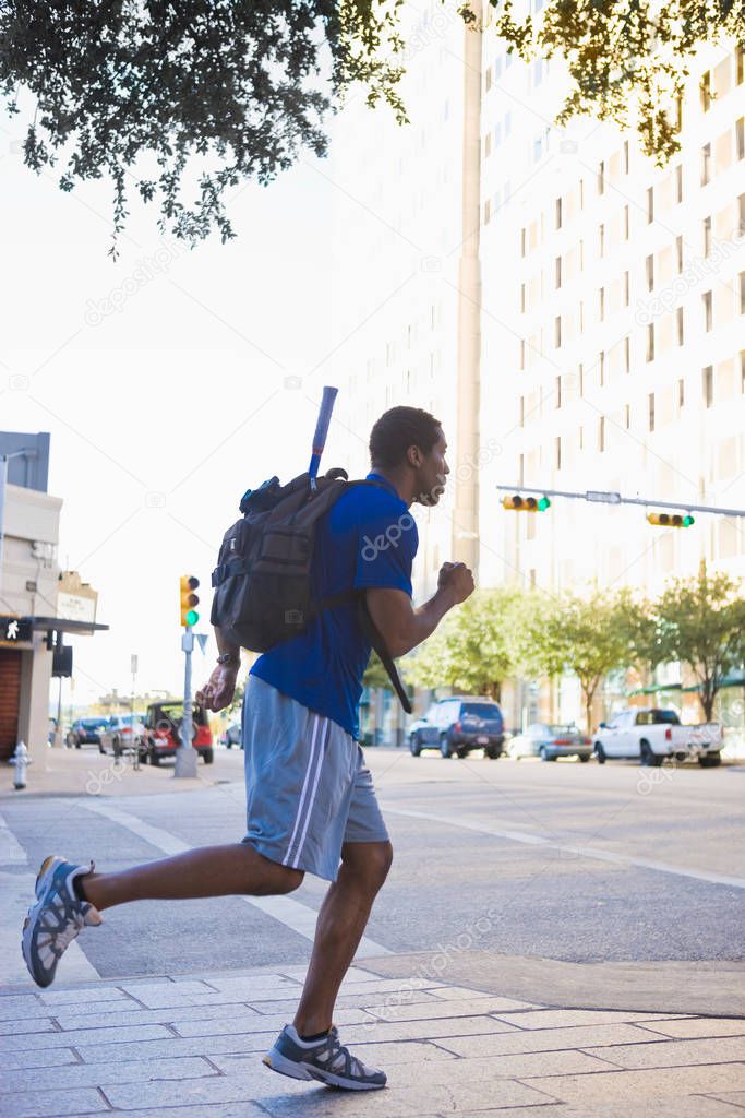 man running in urban setting