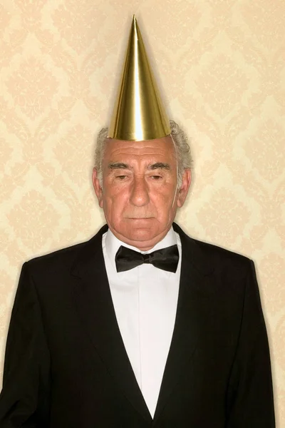 Senior Man Wearing Party Hat — Stock Photo, Image