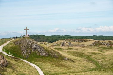  St Dwynwen's Cross, Llanddwyn Island in Anglesey, North Wales clipart