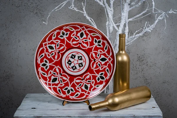 Decorative, painted plate on a gray background. — Stock Image Decorative Painted Plate Gray Background Royalty Free Stock Images
