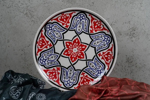 Decorative, painted plate on a gray background. — Stock Image Decorative Painted Plate Gray Background Royalty Free Stock Images