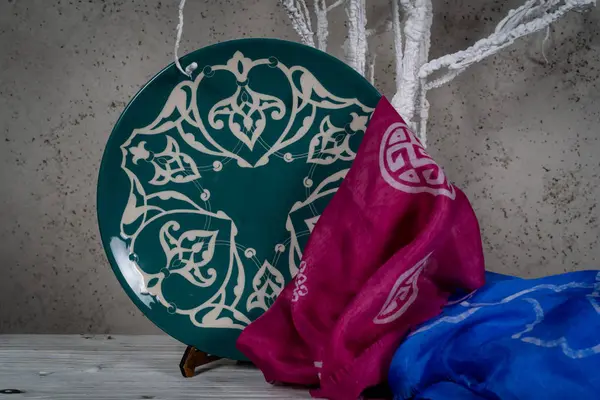 Decorative, painted plate on a gray background. — Stock Image Decorative Painted Plate Gray Background Stock Photo