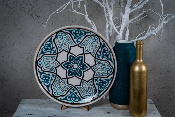 Decorative, painted plate on a gray background. — Stock Image Decorative Painted Plate Gray Background Royalty Free Stock Photos