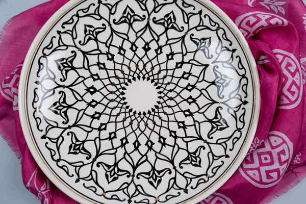 Decorative, painted plate on a kyalagai background. — Stock Image Decorative Painted Plate Kyalagai Background Royalty Free Stock Photos