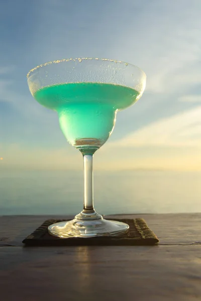 Margarita cocktail glass on the beach at sunset — Stock Photo, Image