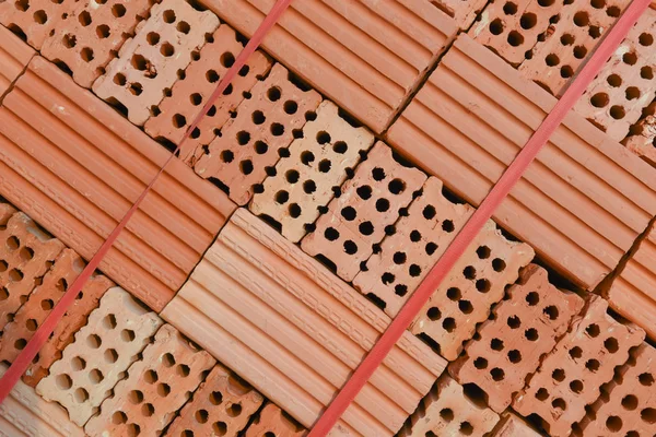 Stack of new red brick pack background — Stock Photo, Image