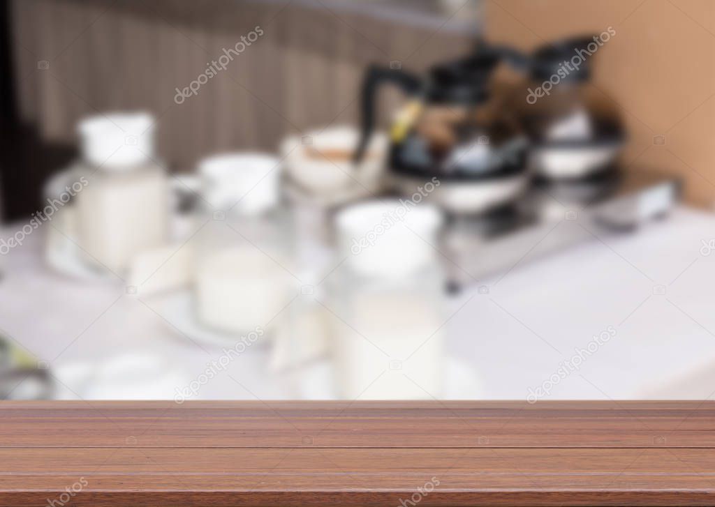 Wood top table with coffee cafe interior background