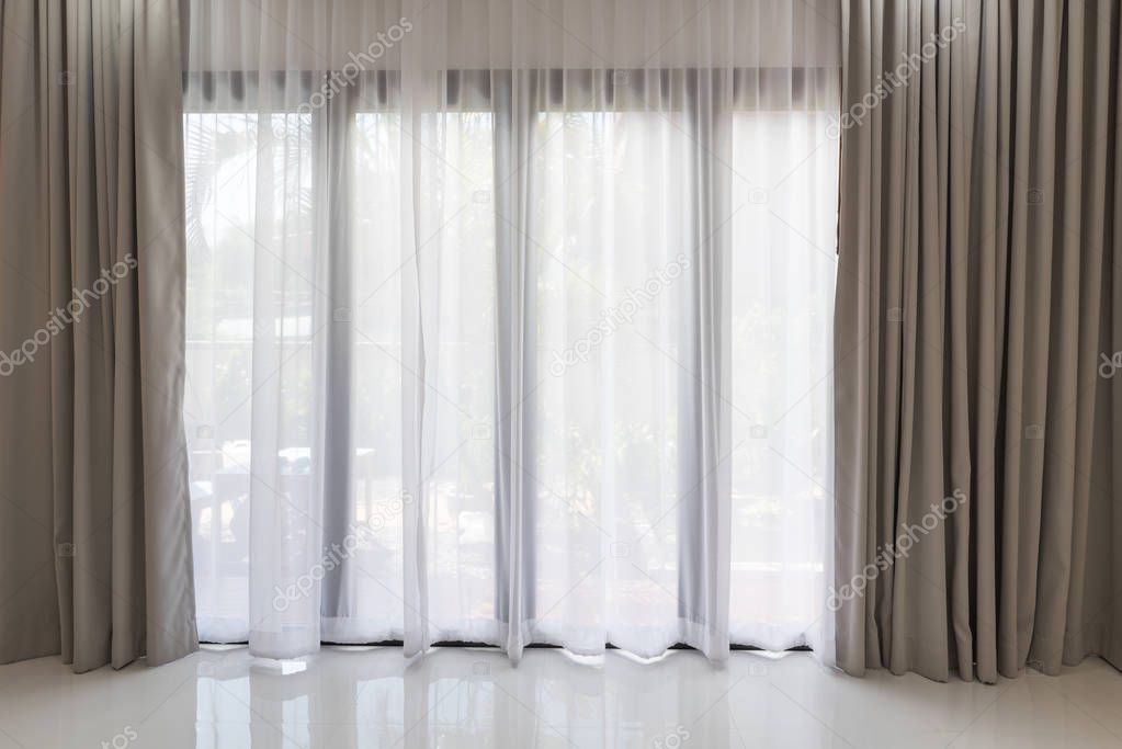 Beautiful modern grey and white curtains in living room