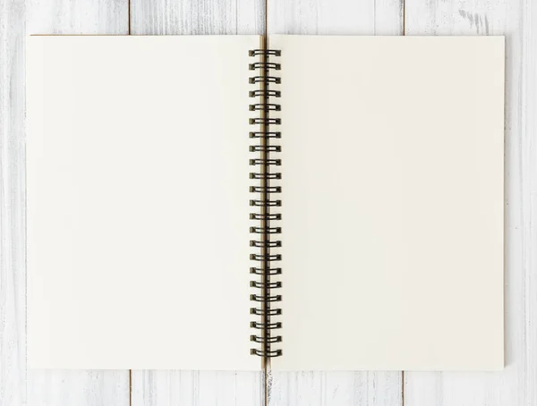 打开笔记本在白色木桌背景, 平的放置 — 图库照片