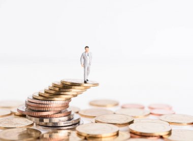 Minyatür başarılı işadamları üstüne altın mone standı