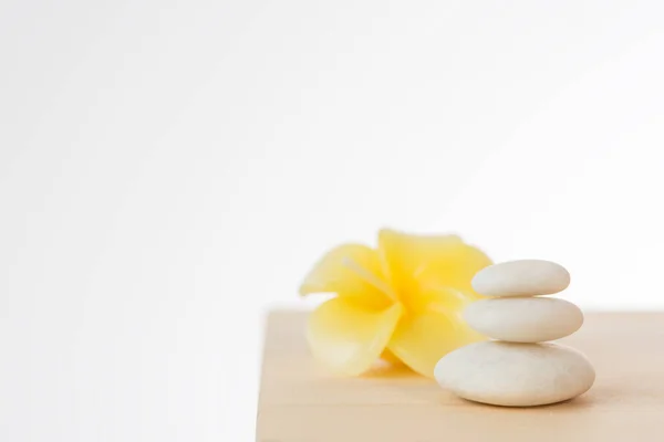 Frangipani Flower Candle Zen Stone Spa Wooden Table Isolaed White — Stock Photo, Image