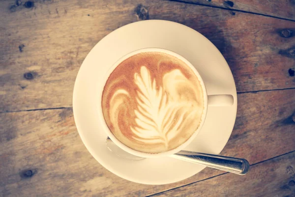 Ovanifrån Kaffekopp Latte Konst Gammal Vintage Trä Bord Med Kopieringsutrymme — Stockfoto