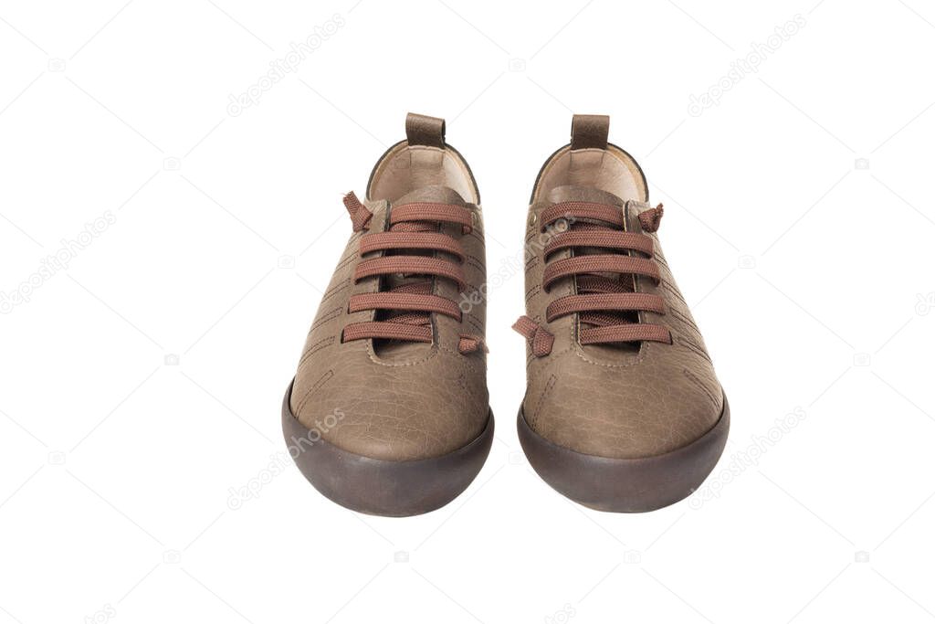 Front view of brown leather shoe isolated on white background with path