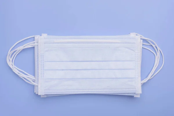 Surgical Masks Pack Soft Blue Background Flat Lay — Stock Photo, Image