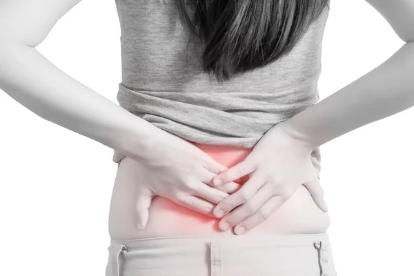 白い背景に分離された女性に腰痛や痛みを伴う腰。白い背景のクリッピングパス. — ストック写真