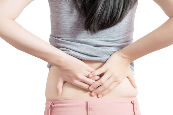白い背景に分離された女性に腰痛や痛みを伴う腰。白い背景のクリッピングパス. — ストック写真