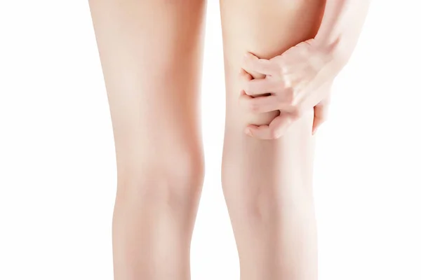 在白色背景上孤立女人大腿的急性疼痛。白色背景上剪切路径. — 图库照片