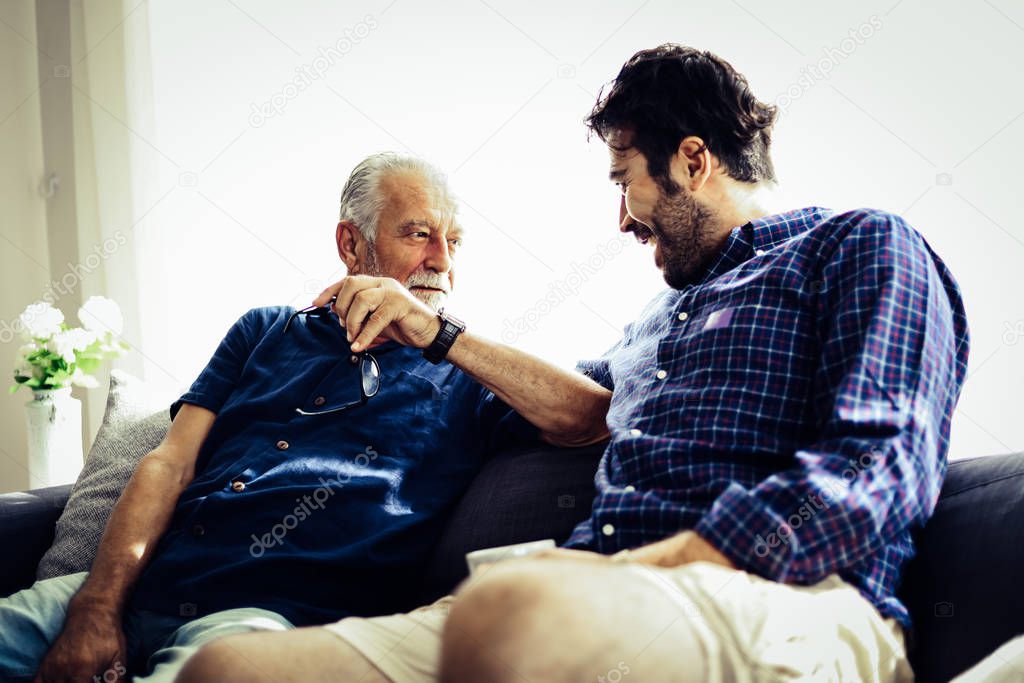 Family time dad and son talking discussion lifestyle in holiday at home.