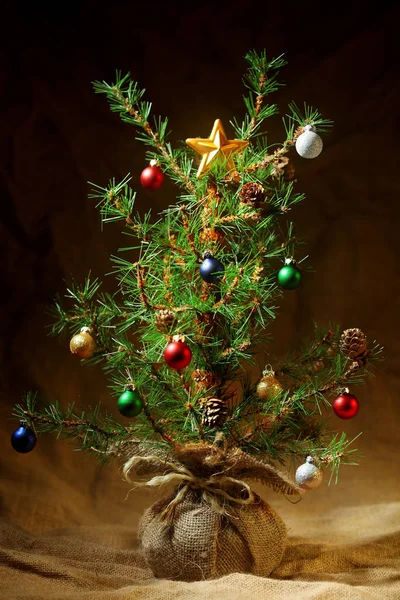 Little decorated Christmas tree background — Stock Photo, Image